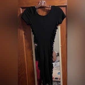 Black pants suit in women’s size small with cuts down the side
